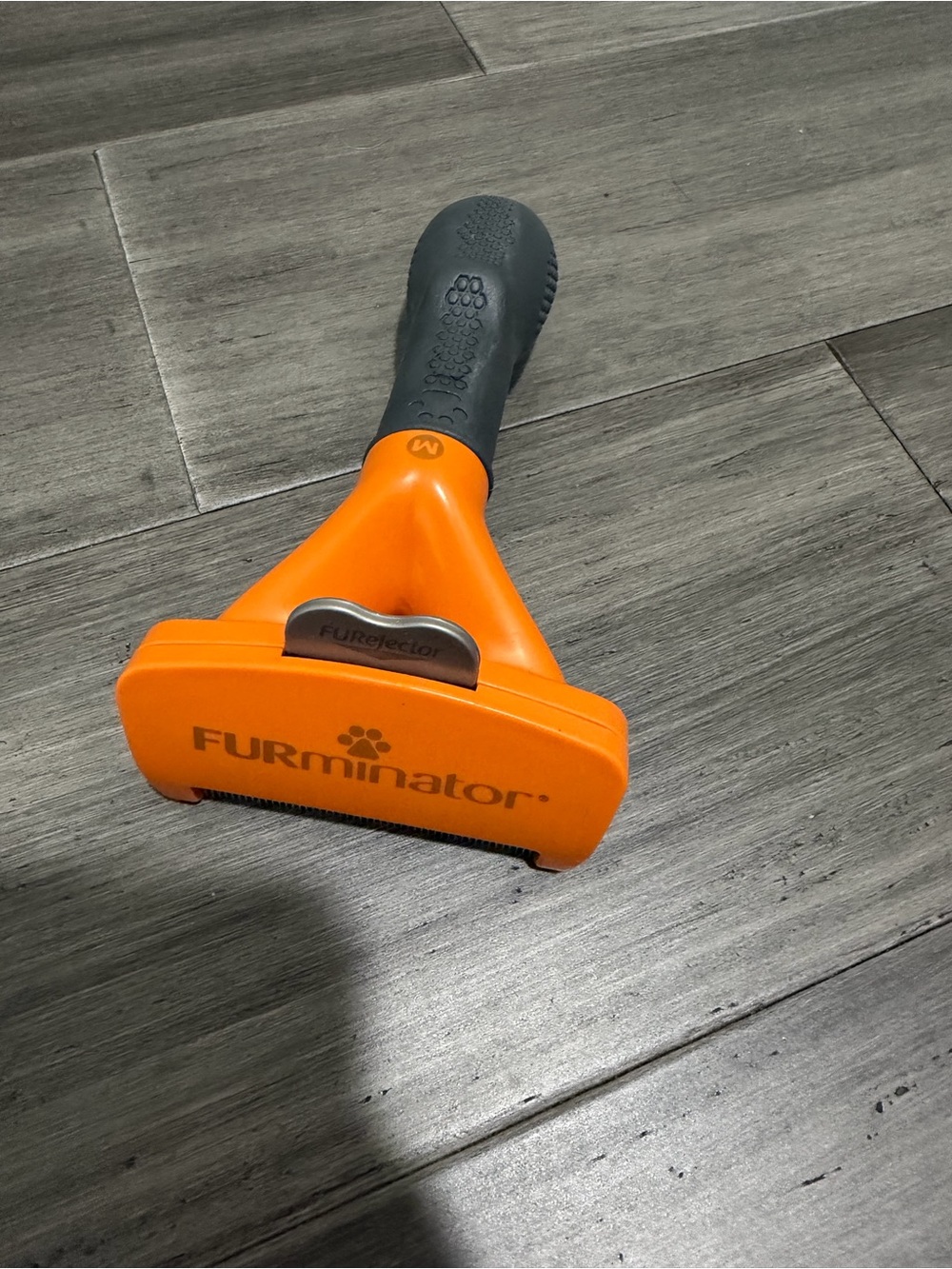 FURminator Orange and Black Pet Deshedding Brush